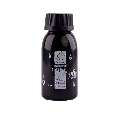 زيت ثوم حج عرفة لتقوية الشعر وعلاج التقصف بتركيبة مغذية تحفز النمو وتمنح شعرك كثافة ولمعانًا طبيعيًا | Hag Arafa Garlic Hair Oil for Strong, Healthy Hair.